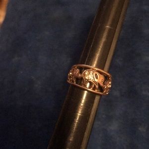 Cute qvc rose gold and topaz elephant ring.